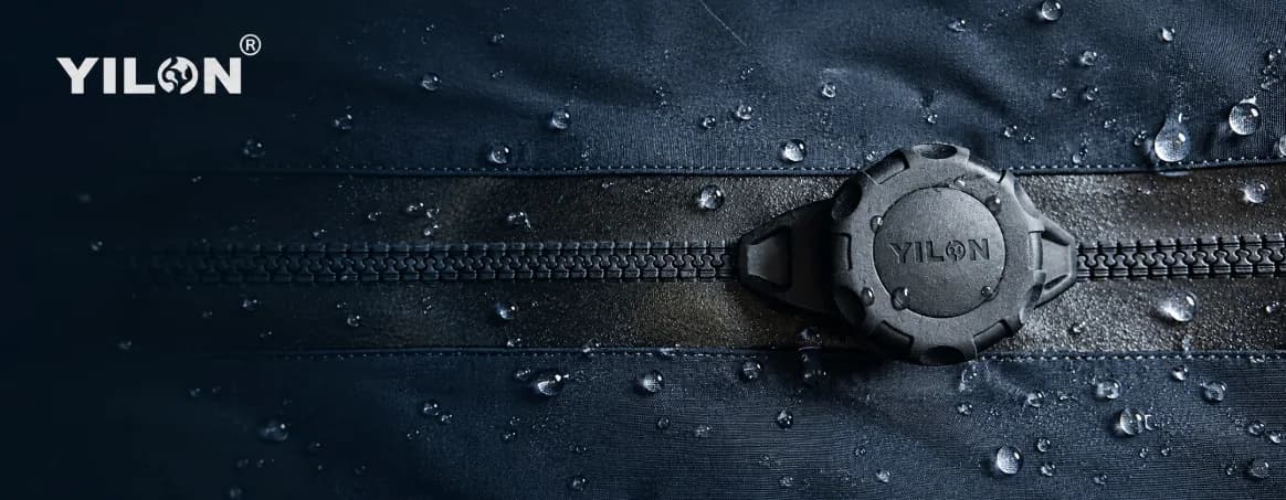 Close-up of a waterproof zipper covered in water droplets
